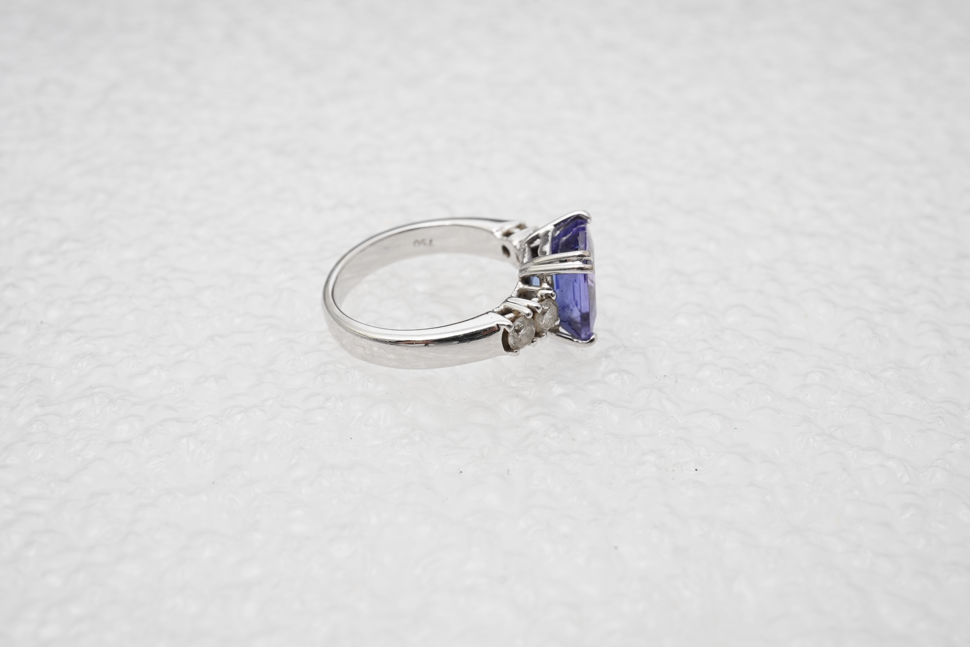 A tanzanite and diamond ring